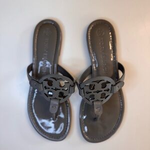 SOLD.: Tory Burch Grey Patent Miller Logo Thong Sandals